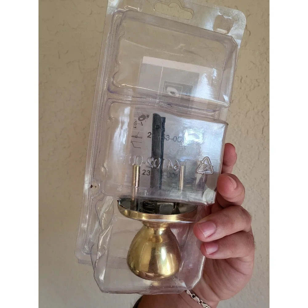 Kwikset Tylo Polished Brass Passage Hall/Closet Door Knob in Gold